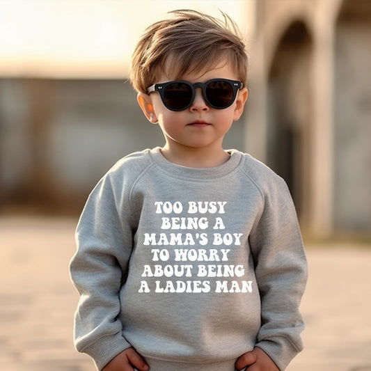 TOO BUSY BEING A MAMA'S BOY